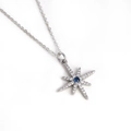 Silver star pendant necklace with a blue center stone and shimmering clear zircons - White Gold Eight-pointed Star