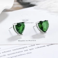 Detail of heart-shaped emerald green zircon earrings with classic S925 silver 3-prong setting - Green Zirconia