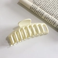 Large cream-colored shark hair claw clip in a minimalist plastic design for women - Off White