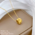 Detail view of gold cylinder pendant necklace with dimensions 0.8x1.1cm and weight 4.4g - Gold