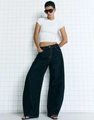Full view of high waist wide leg jeans in dark blue on a model with white crop top - S / Blue Black
