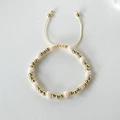 Detail of 18k gold plated beaded bracelet with pastel faceted crystal and adjustable cord - Off White