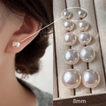 Pendientes de perlas minimalistas de 8mm en modelo y dentro de joyero elegante - US 8 / Rosa