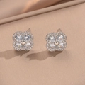 Elegant silver four-petal flower stud earrings with sparkling cubic zirconia inlay - Silver
