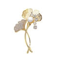 Elegant gold ginkgo leaf brooch featuring a white pearl and sparkling zircons - Ginkgo Leaf Pearl