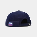 Detail of dark blue docker hat with Russian flag patch and adjustable metal buckle strap - Adjustable / Navy Blue