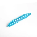 Single blue polka dot sponge hair roller made of soft fabric on a white background - Green