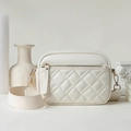 Chic beige quilted crossbody bag with gold zippers and a wide fabric shoulder strap - Off White