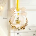 Gouden kerstkrans hanger met ster en feestelijke champagnekleurige linten decoratie - Gouden Strik Krans Hanger