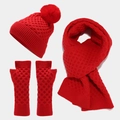 Detailed view of red knitted winter set including pompom beanie scarf and arm warmers - Red