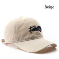Beige cotton baseball cap with black letter embroidery and adjustable metal buckle strap - Beige