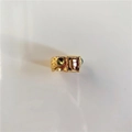 Vintage Goldring mit Hammerschlag-Textur, smaragdgrünen und rauchgrauen Steinen - Größe 7 / Champagner