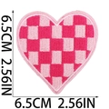 Detail view of 6.5cm pink checkerboard heart embroidery patch showing texture and size - Pink and White Plaid Heart (Large)