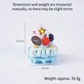 Portachiavi cupcake in PVC blu con lampone e decorazione in cioccolato - Torta waffle blu con cinturino rosa