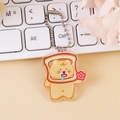 Cute cream yellow bear acrylic keychain with bead chain for bags and accessories - Drooling Bear