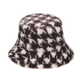 Close-up of houndstooth plush bucket hat showing thick faux rabbit fur texture - Brown