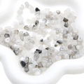 Irregular translucent white and black marble acrylic beads in a star shaped dish - Transparent Light Gray