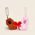 Cute plush capybara and pink beaver keychains forming a heart with LOVE text - LOVE Embroidery Duo