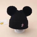 Detail of a black knit hat with double faux fur pom poms and unicorn embroidery for girls - One Size (3-10 Years) / Black