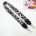 Detail of adjustable black and white leopard print bag strap with gold metal buckles - White Light Grey Leopard - Gold Buckle