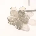 Macro detail of a translucent grey flower hair claw clip with a durable metal spring - Jelly Flower Hair Clip - Blue Gray