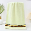 Absorbent light green cotton face towel featuring colorful geometric stripe accents - Sugg Style (32 Ply) / 110g (34x73cm) / Yellow