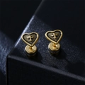 Gothic gold heart stud earrings with black enamel cross on a jewelry box background - Single Piece / Gold