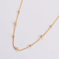 Minimalistische Goldkette aus Edelstahl mit polierten und mattierten Perlen - Gold