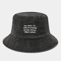 Detailed close-up of dark grey washed denim bucket hat with white embroidered slogan - M (56-58cm) / Black