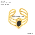 Detail showing 18k gold plated twisted stainless steel ring with black drop drip oil inlay - Three-layer Twist Water Drop Style (SR701G)