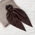 Elegant dark coffee satin scrunchie with long ribbons and smooth silk texture - Brown