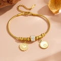 Gouden roestvrijstalen slangarmband met hartjesbedel en kristallen kralen op houten basis - Gouden Hart Ring Stijl (A112)