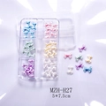 Nail art strikbedeltjes in diverse pastelkleuren in een transparante plastic doos met 6 vakken - Matte Strik Stijl (H27)