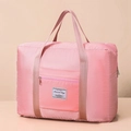 Pink quilted waterproof travel storage bag with large capacity and sturdy handles - Pink