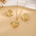 Macro view of gold square pendant and earrings with hammered metal leaf texture - Rhombus Hammered Style (E6210-16)