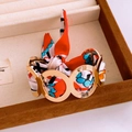 Golden double-layer cuff bracelet with a colorful silk scarf wrap in a jewelry box - Gold Multicolor Geometric Scarf Bangle