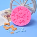 Pink silicone bow mold with various shapes for fondant cakes and DIY craft projects - Pink Multi-Grid Bowknot Style