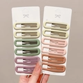 Matte oval hollow hair clips set in Morandi tones for girls, featuring six soft colors - Dusty Style 12Pcs Set