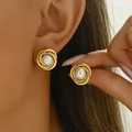Detail view of French vintage gold spiral pearl earrings for elegant women's jewelry set - Gold Earrings