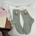 Green cotton crew socks with embroidered bear in party hat and speckled yarn texture - One Size / Green Bear