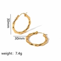 Detail of 30mm golden bamboo textured hoop earrings weighing 7.4g in stainless steel - Round Bamboo Style (TE6063)