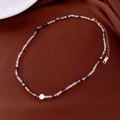 Close-up of beaded necklace with purple crystals, white pearl, and gold lobster clasp - 31# Purple Bead Style