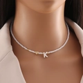 Beaded necklace featuring a gold heart and shell letter K pendant for women - Letter K