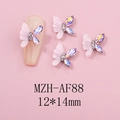 Detailed macro view of 12x14mm resin butterfly nail charms with iridescent rhinestones - AB Resin Carved Rhinestone Style (AF88)