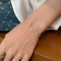 Silver thin chain bracelet featuring heart pendants worn on wrist for a minimalist style - Ultra-fine Heart Pendant (SL1419)