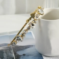 Detail of crystal headband with emerald and pear-cut stones on gold metal base - C8432-Gold