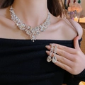 Close-up of sparkling zircon necklace and earrings set worn in elegant banquet setting - 42# Earrings And Necklace - Silver (two-piece Set)