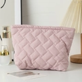 Close-up of pink quilted fabric cosmetic bag with textured woven pattern and top zipper - 27*6.5*17.5cm / Lotus Pink