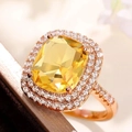 Elegant rose gold double halo ring with cushion-cut yellow zircon and micro-pave setting - Yellow + Rose Gold