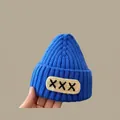 Winter royal blue knit hat for kids with ribbed texture and letter patch detail - Xxx Hat Blue (for 2 Months To 2 Years Old)